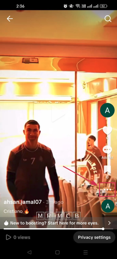 Three dots icon (⋯) on the TikTok video